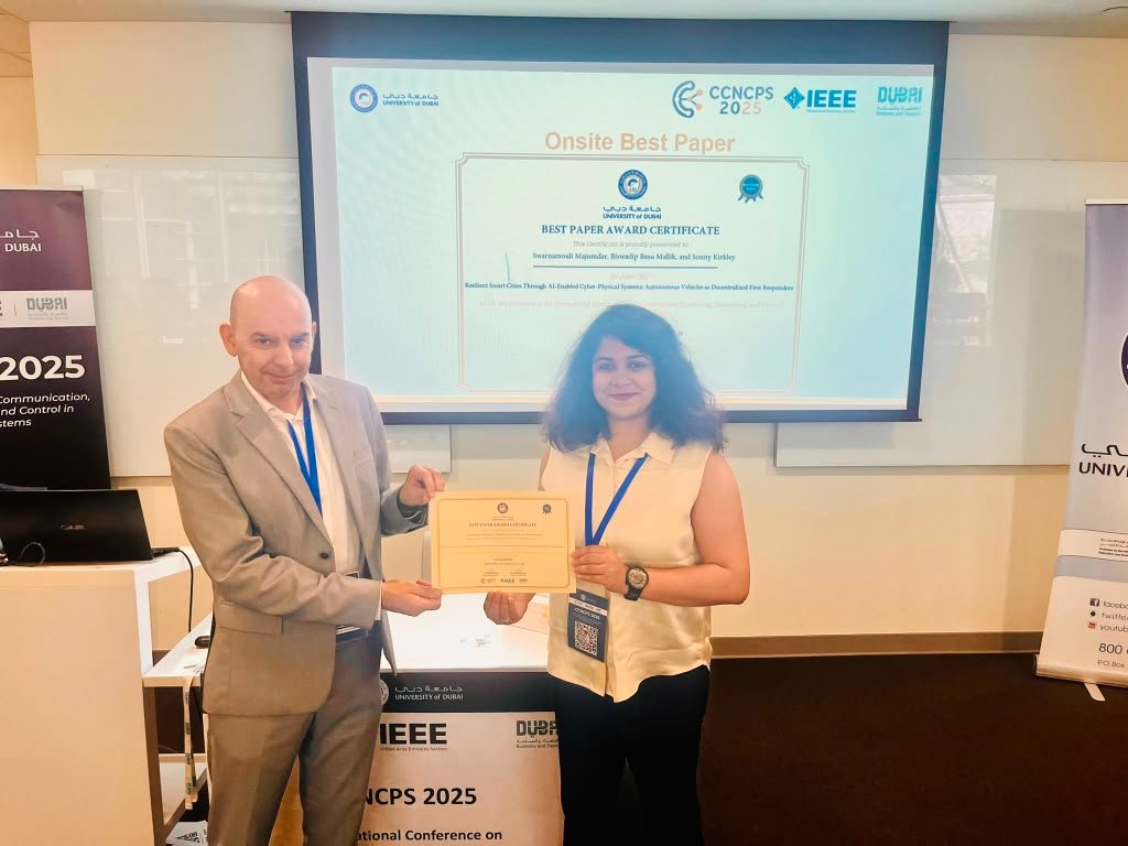Swarnamouli Majumdar receiving an onsite Best Paper certificate at CCNCPS 2025.